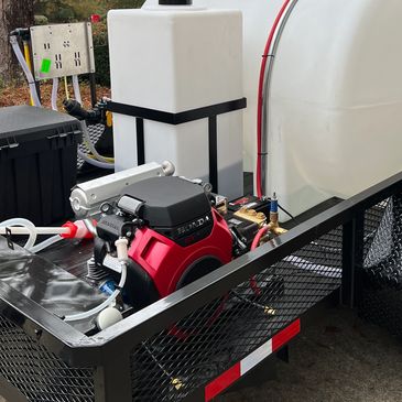 GGF's pressure washing rig with 8 GPM pressure washer, 55G chemical tank and 525G water tank