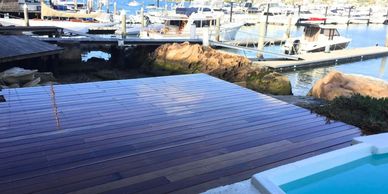 Custom timber decking installation creating stylish outdoor entertaining space in Sydney backyard