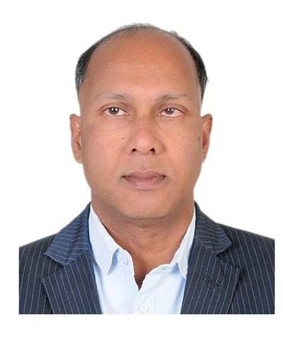Professional headshot of a man in a suit jacket.