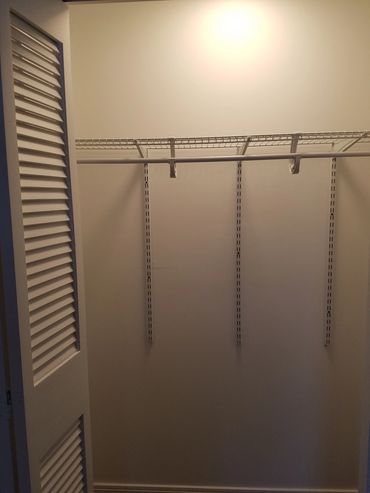Lighted closet in bedroom 2.
