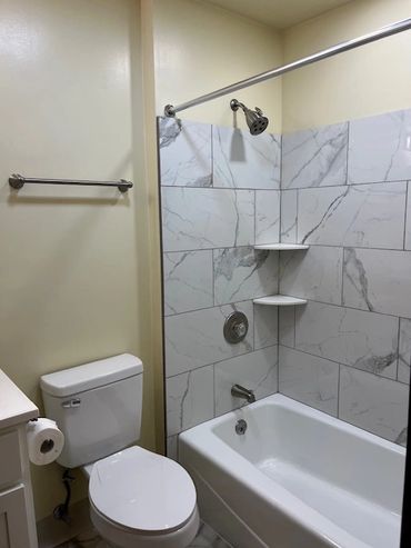 Bathroom tub and shower.