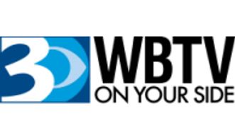 Logo of WBTV news with slogan 'On Your Side'.
