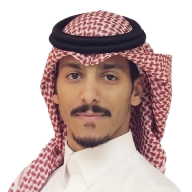 Portrait of a man wearing traditional Saudi attire with a headscarf and white thobe.