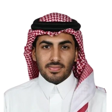 Portrait of a man wearing traditional Middle Eastern attire with a red and white checkered headscarf.