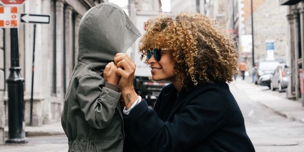 Mother smiling at her son
