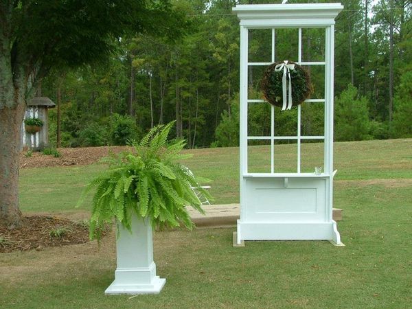 Large windows and fern stand rental for weddings or events