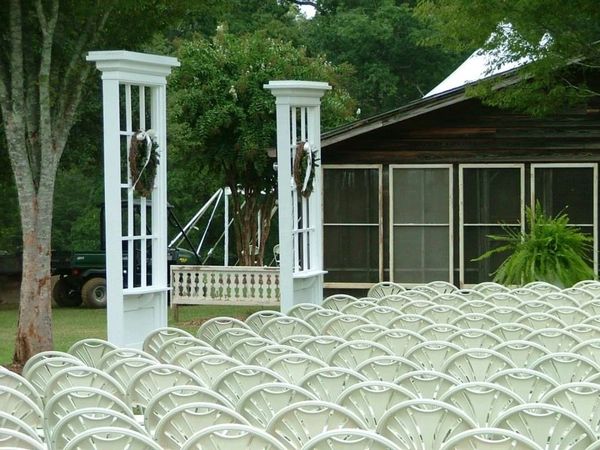 wedding set up outside with large window props