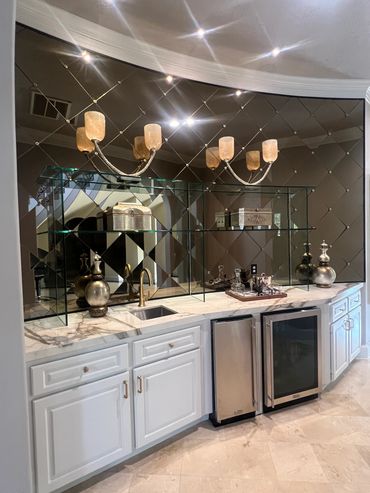 Curved wall, custom diamond shaped wall mirrors and custom glass shelving by Century Glass