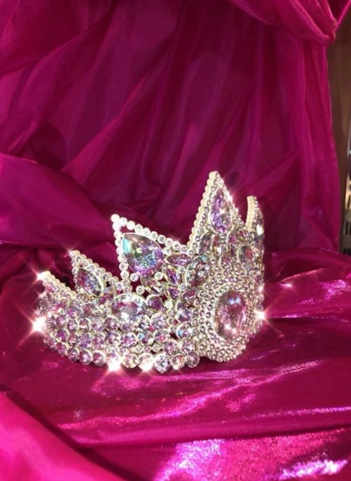 Capture the crown while wearing the perfect gown picked by us at Desi's!