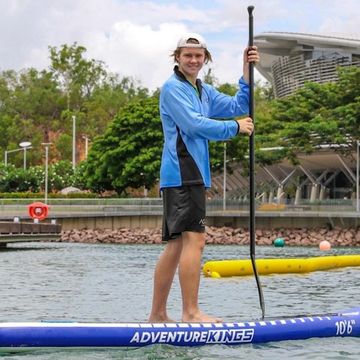Man paddleboarding in Darwin