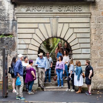 Group of people under Argyle Stairs, The Rocks, Sydney