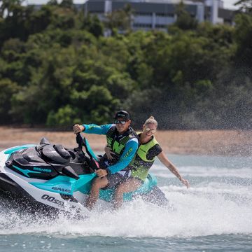 Two people riding a Jetski in Darwin 