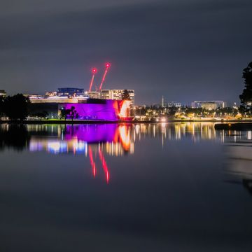 National Museum of Australia at night across from Lake Burley Griffin