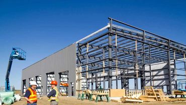 commercial contractors erecting steel building