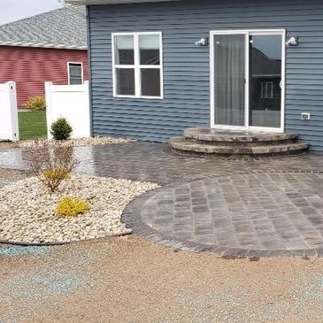 Landscaping and hardscaping services and design, including paver patios, retaining walls, lawns, etc