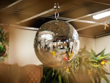 glitter ball hanging from a ceiling