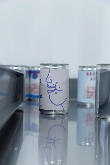 custom can on a metal table