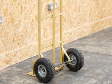 prop trolley against clear wall