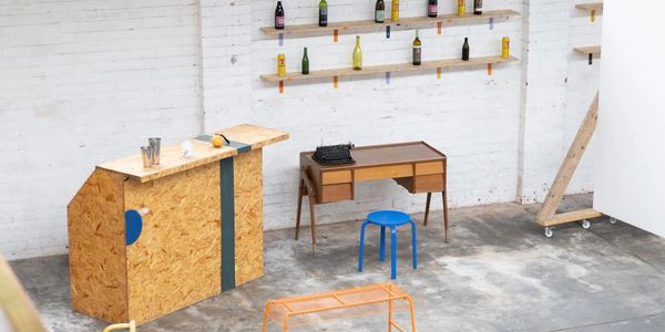 pop up bar in a warehouse with bench and desk