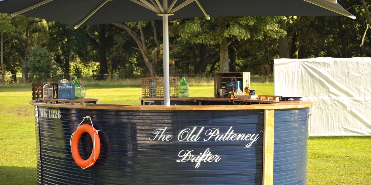 bespoke whisky bar in a field