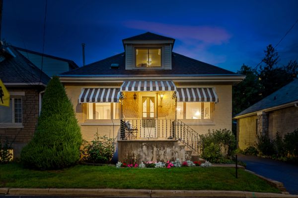 Small house lit up at night