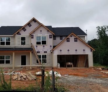 House undergoing siding remodel
