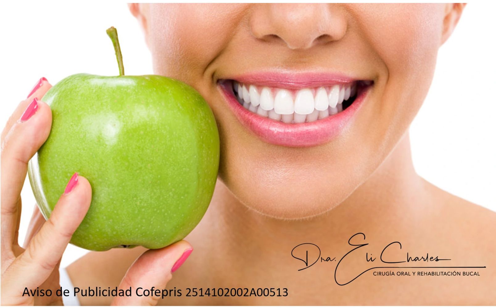 Close-up of a smiling woman holding a green apple, showcasing white teeth.