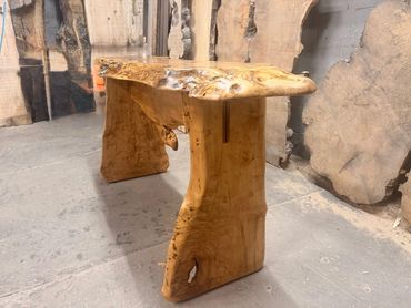 Maple Burl foyer table with maple burl base and black walnut mortis and tenon detail