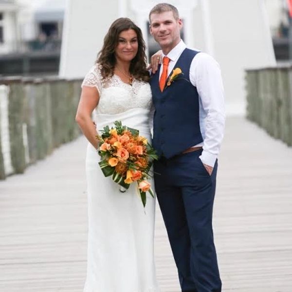 Bride and groom in Florida. Bride wearing a bespoke Susie Grist Couture wedding dress