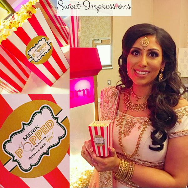 Popcorn in red and white popcorn box at wedding