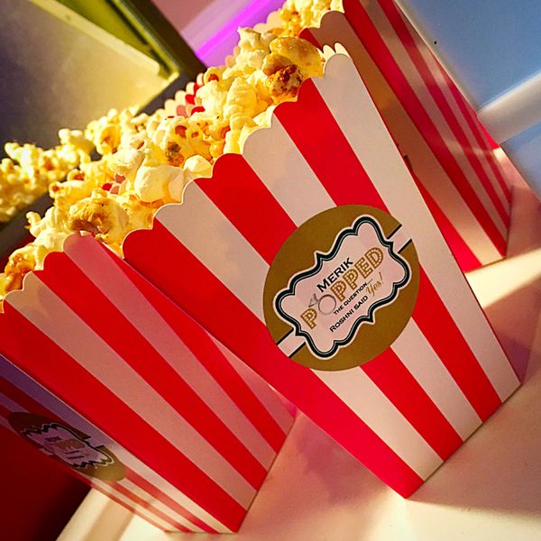 Red and white striped popcorn box