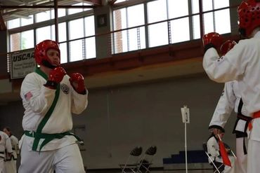 Two karate / Tang Soo Do students sparring