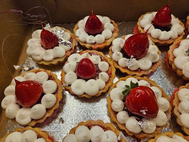 Strawberry Rhubarb Tarts with candied Strawberries and Silver Flakes