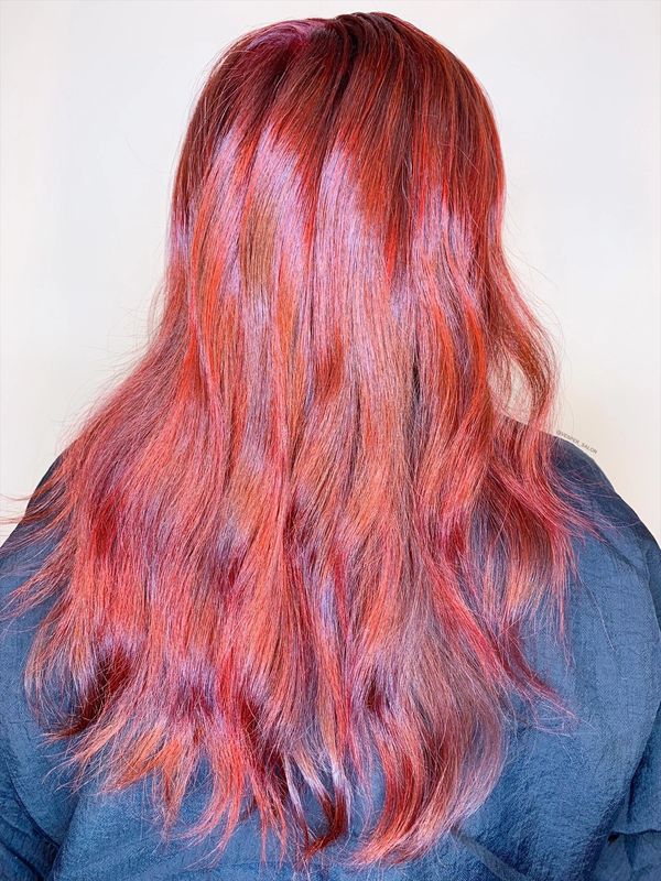 Image of red hair color performed by Vesper Gary, Owner and Master Stylist of VESPER SALON.