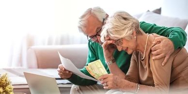 elderly couple in financial distress from creditor harassment
