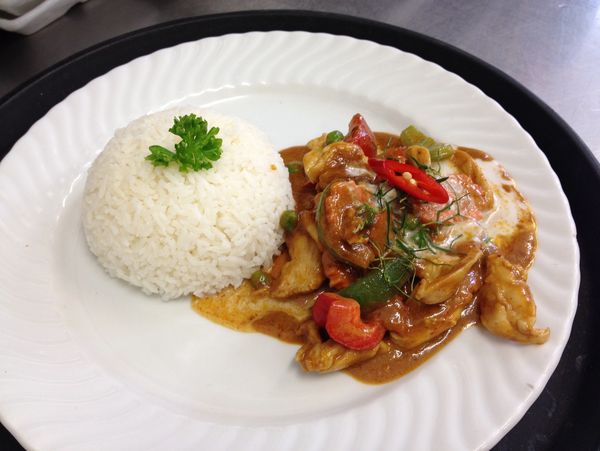 Thai-styled fried spicy chicken with rice