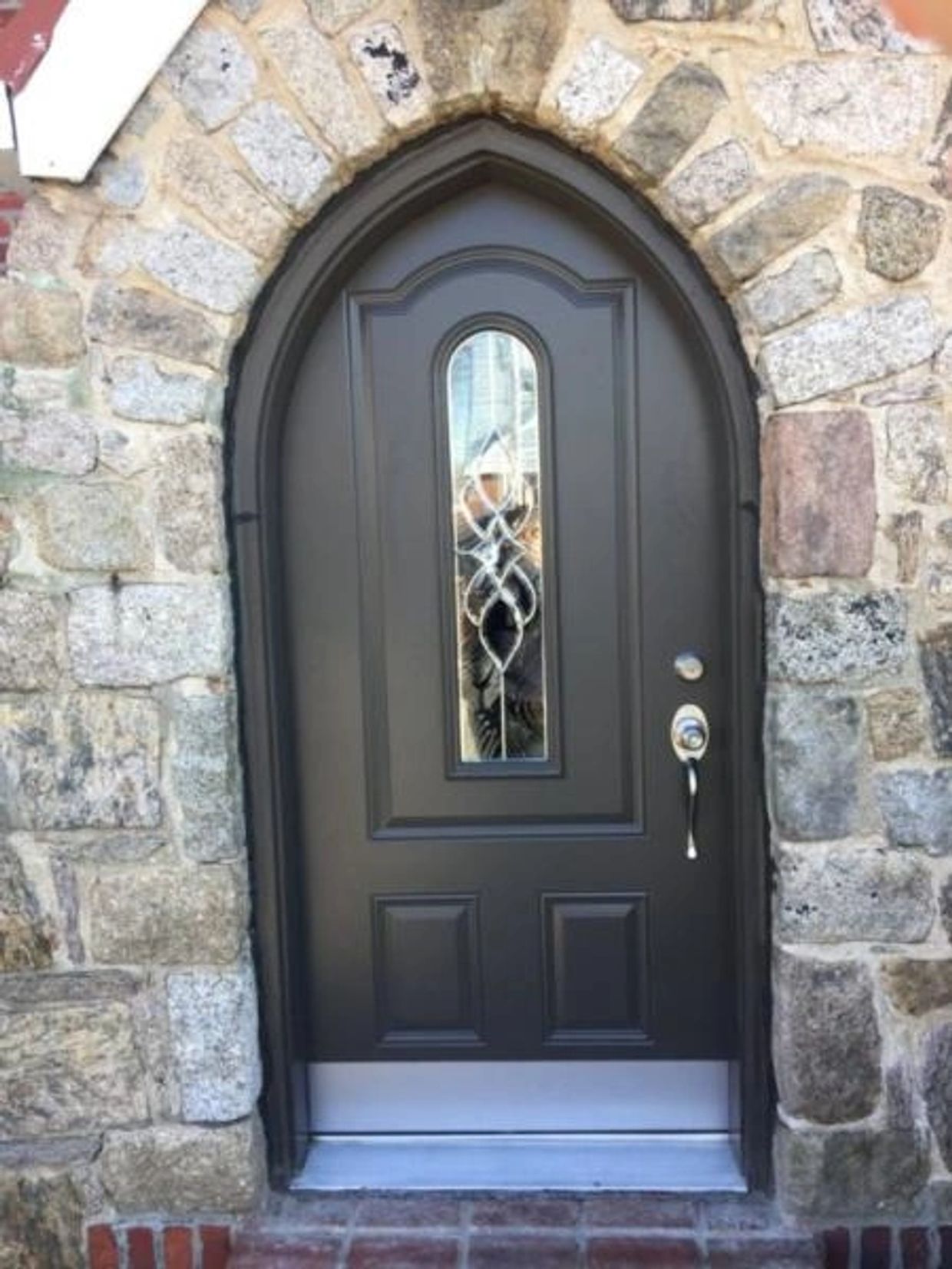 Cathedral top  doors, round top doors for the entrance.