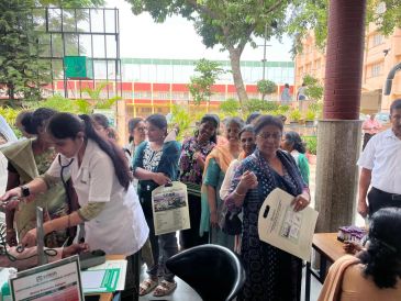 People queuing at a health checkup camp.