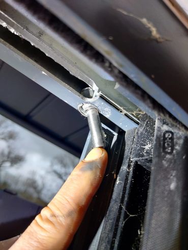 Example of top pin failure on a New Wave door