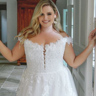 Tulle wedding gown with off the shoulder neckline adorned with 3D flowers, style 44500 by Sincerity