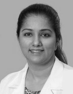 Dr. Tina Puthalon Kunnath