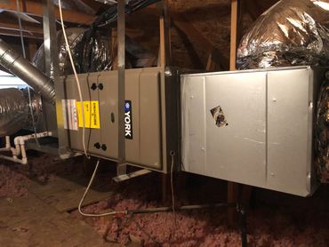 a furnace being installed in a home