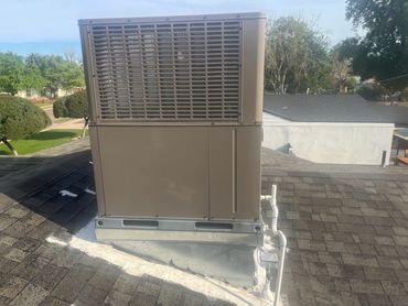 an air conditioner on top of a roof