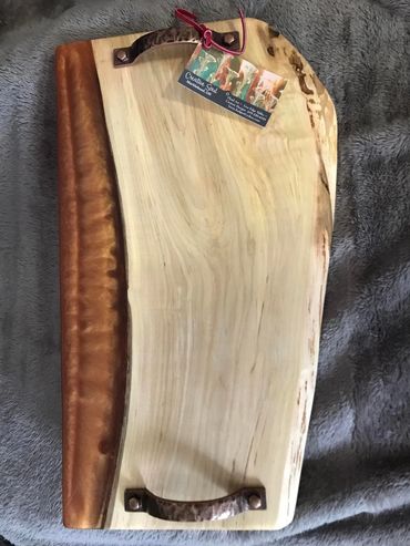 Charcuterie board with gold highlights.