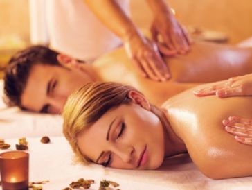 Couple getting couples massage