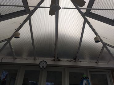 New Jersey hail storm damage to a sunroom