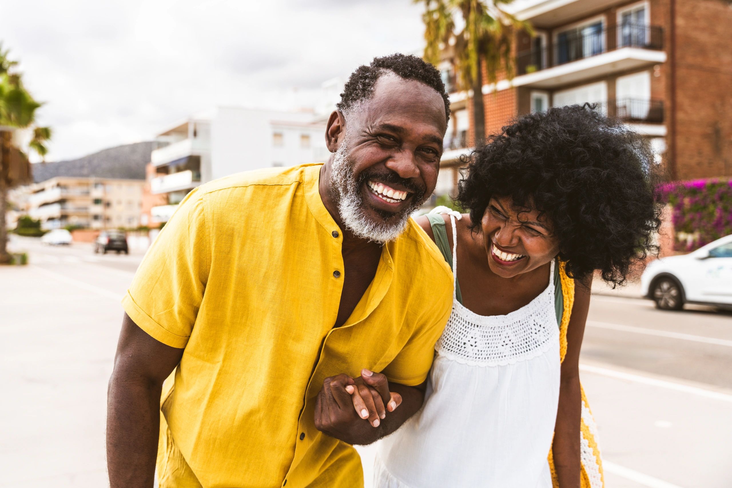 couple walking and smiling
