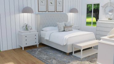 Bright and cozy bedroom with elegant white furniture and soft beige accents.