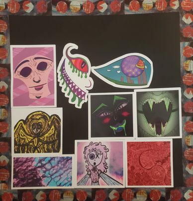 Nine stickers on a black paper with pink and blue colors a couple of creepy faces & abstract swirls