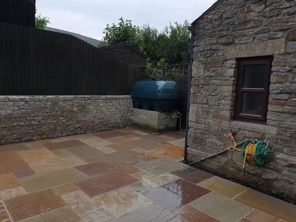 Lovely stone wall with raj green indian stone paving